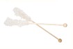 Holzstick mit wei�em Kandis.